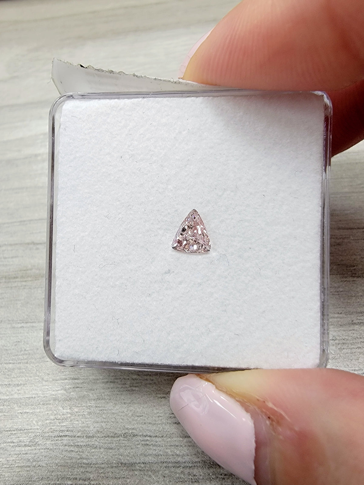 0.29ct Fancy Orangy Pink Trillion Diamond SI1 GIA