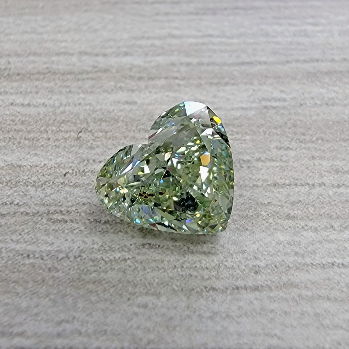 1.07ct Fancy Intense Yellowish Green Heart Diamond SI1 GIA
