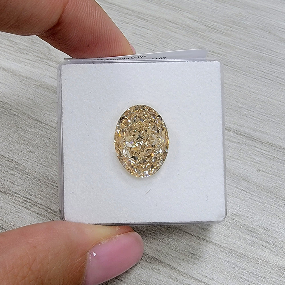10.12ct Fancy Light Yellow-Brown Oval VS1 GIA