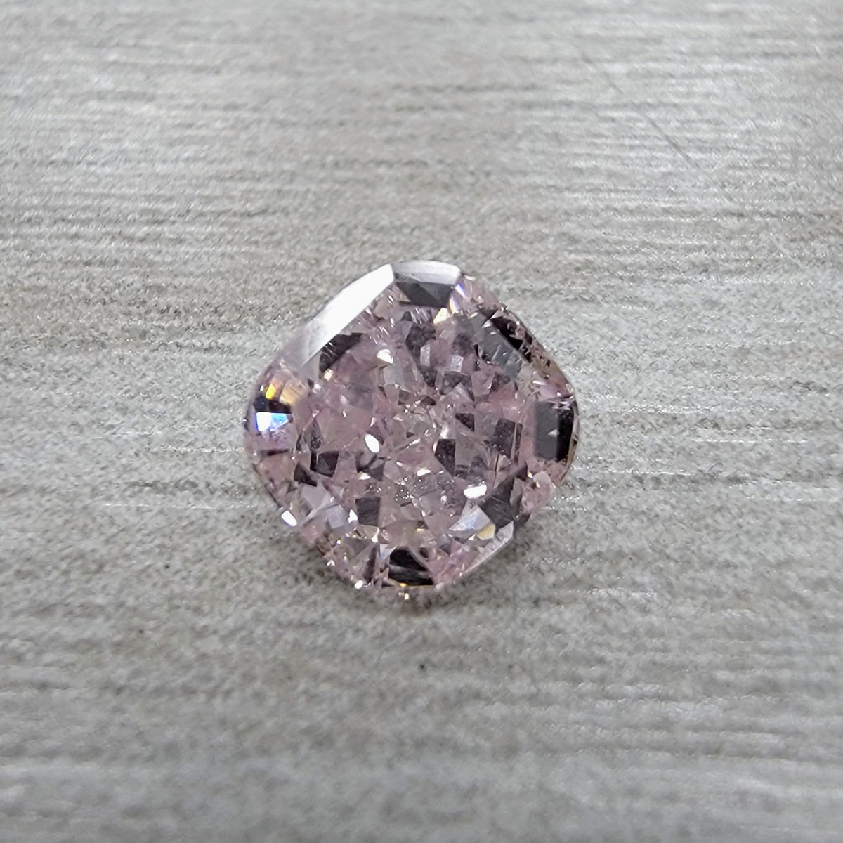 0.73ct Fancy Light Orangy Pink Cushion Diamond I1 GIA