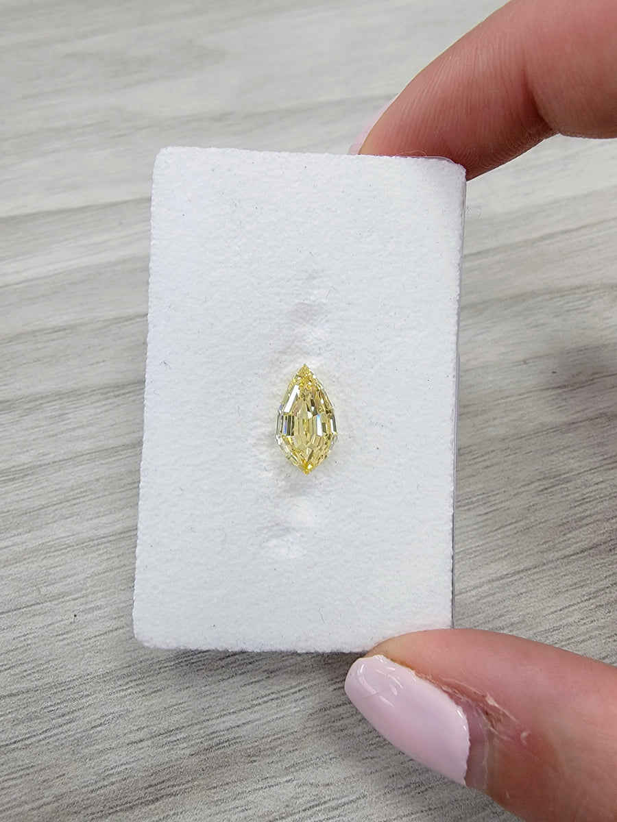 2.21ct Fancy Yellow Step Cut Kite Diamond VVS2 GIA