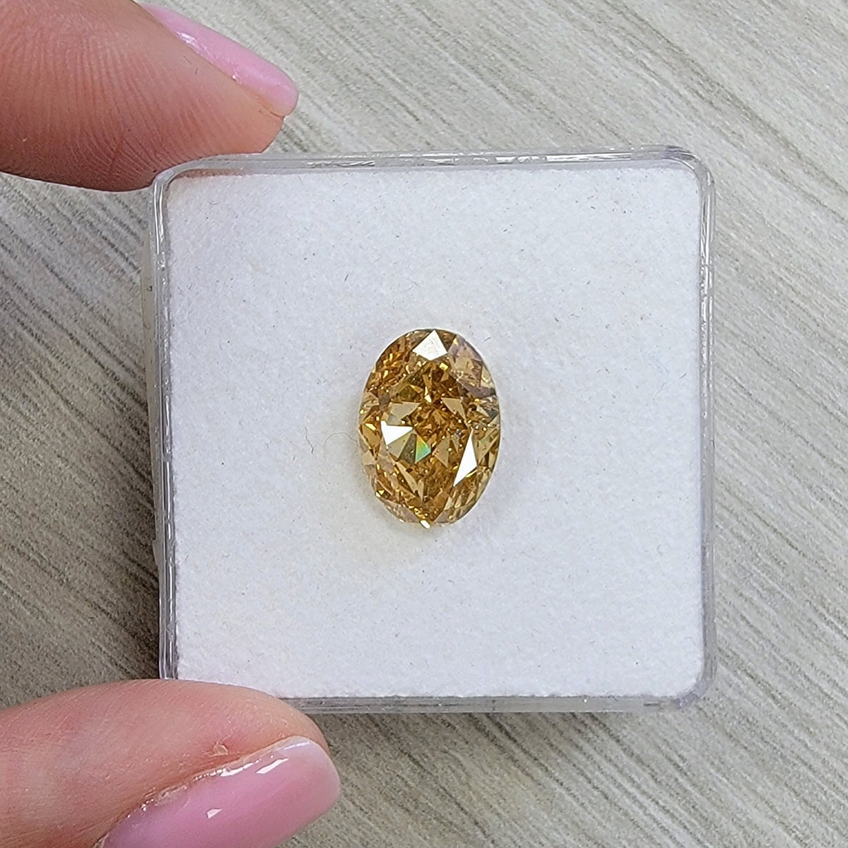 5.02ct Fancy Dark Brownish Orangy Yellow Oval Diamond GIA