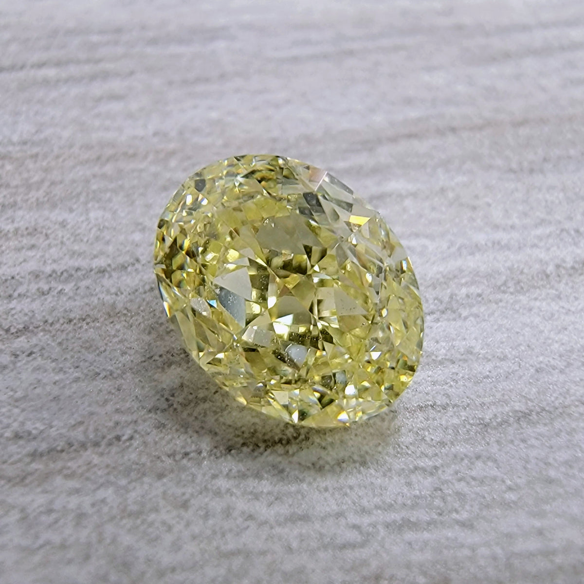 1.09ct Fancy Yellow Oval Diamond VS2 GIA