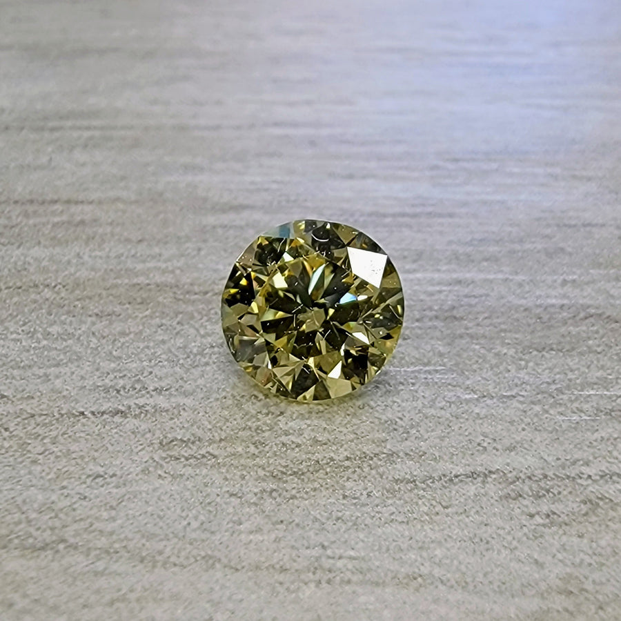0.60ct Fancy Yellow Round Diamond SI1 GIA