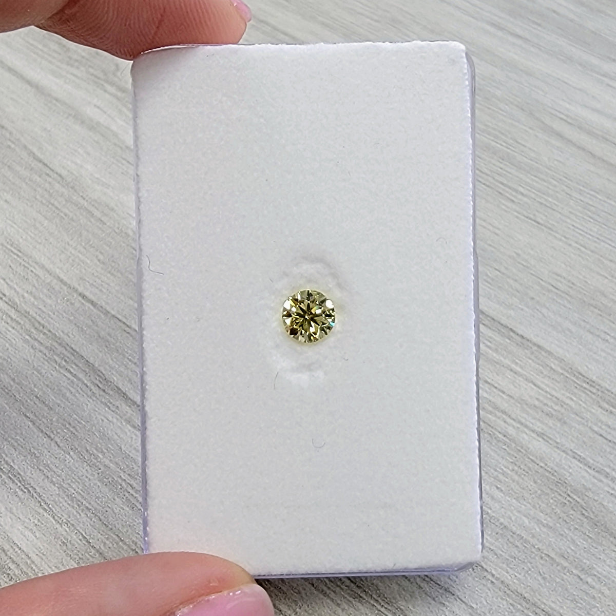 0.60ct Fancy Yellow Round Diamond SI1 GIA