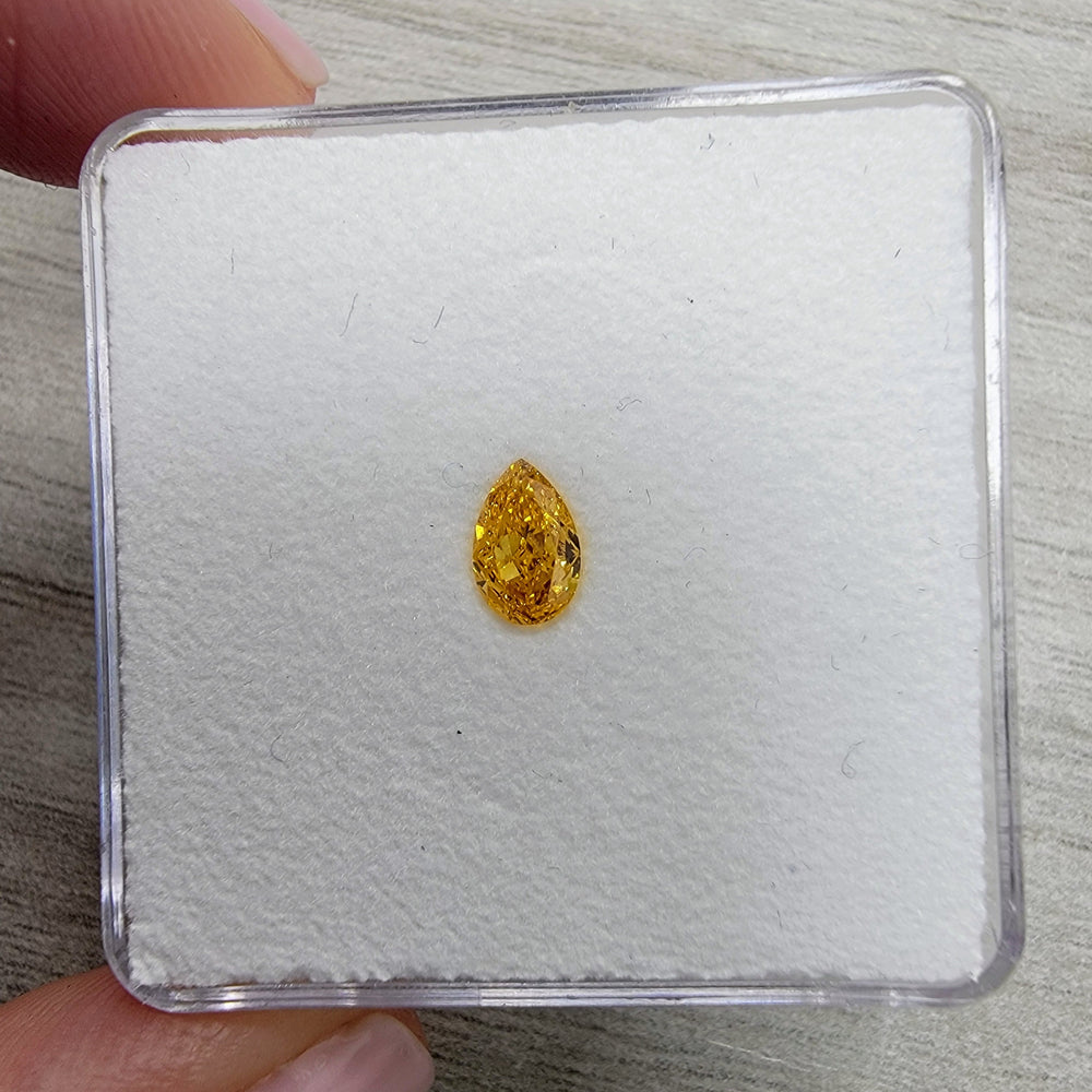 0.50ct Fancy Vivid Yellow-Orange Pear Diamond SI1 GIA