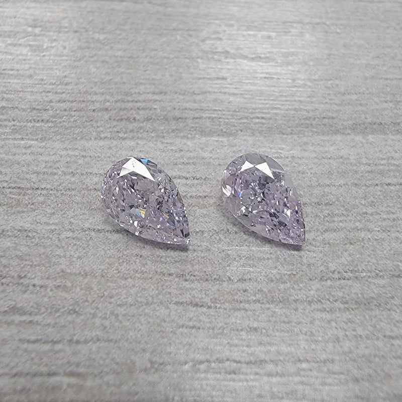 0.55ct & 0.53ct Very Light Pink Pear Diamonds VS2 GIA