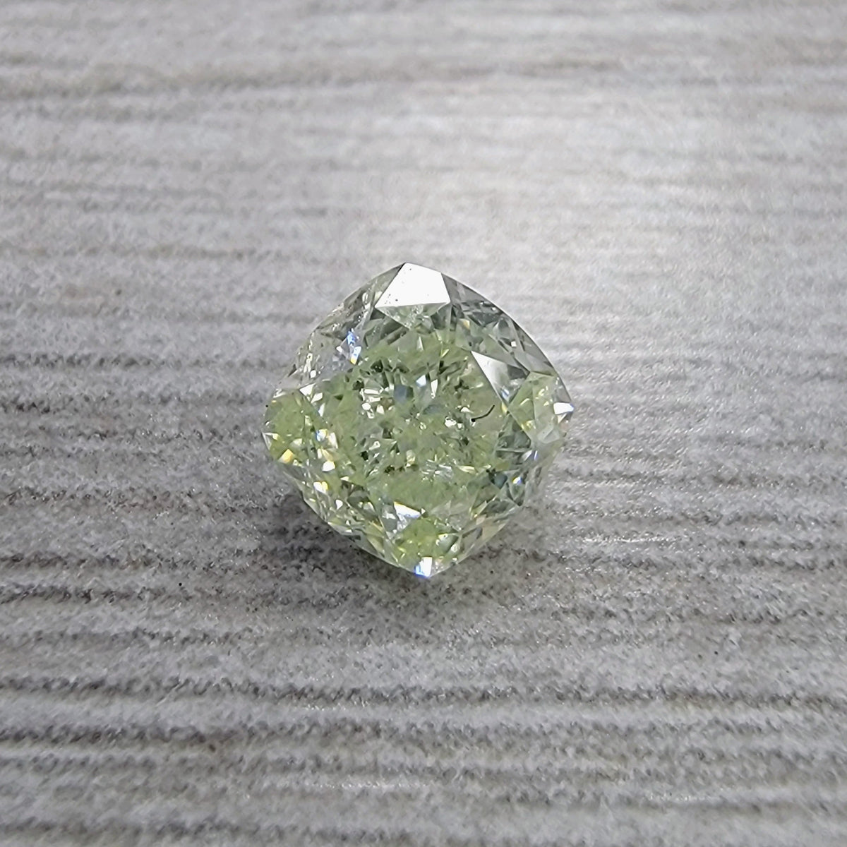 0.63ct Fancy Light Yellow-Green Cushion Diamond VS2 GIA
