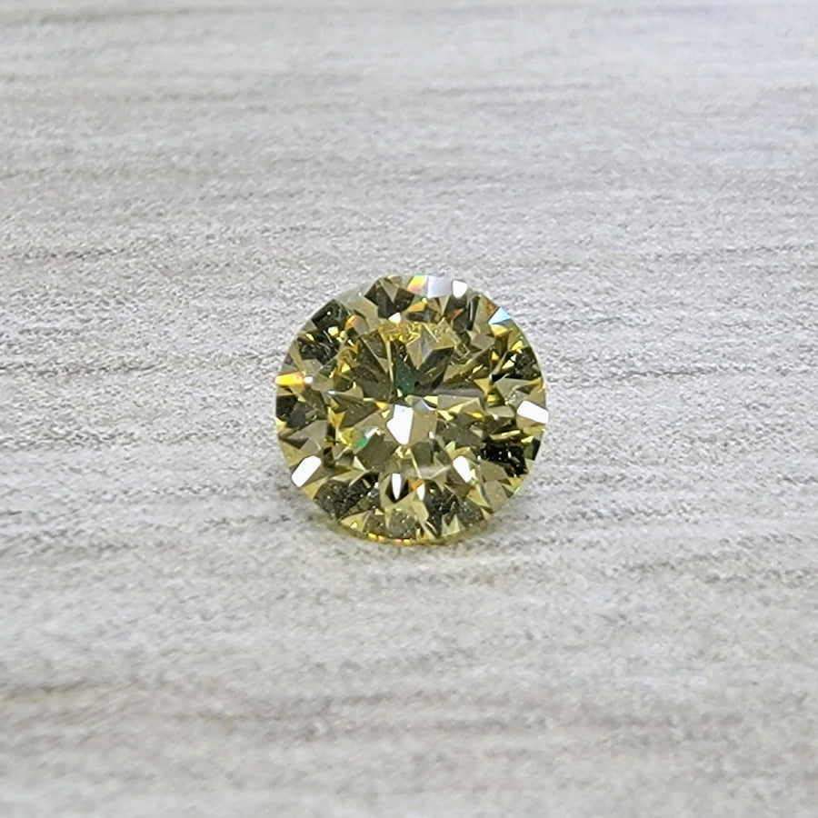 0.51ct Fancy Yellow Round Diamond VS2 GIA