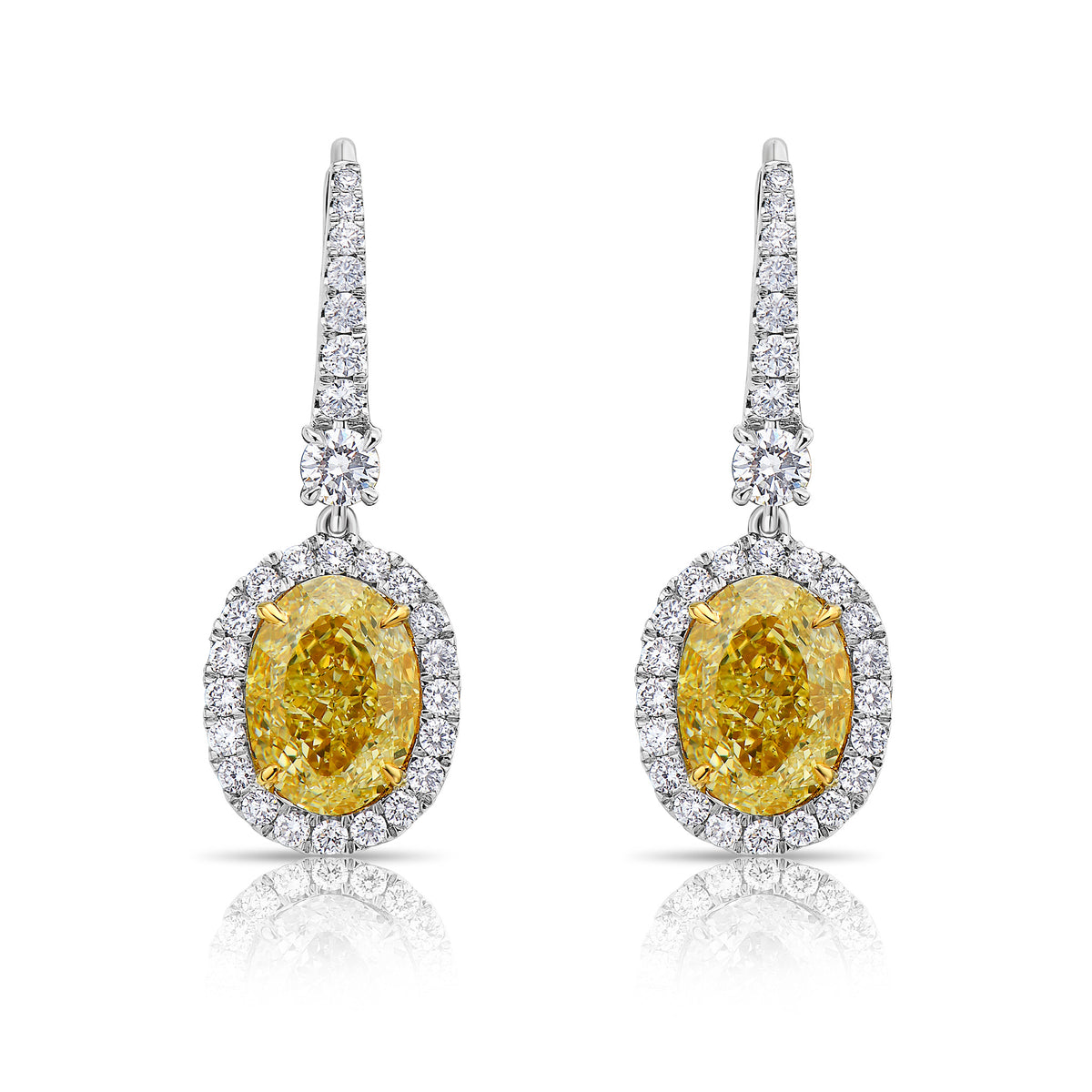 3.03ct & 3.02ct Fancy Light Yellow Oval Diamond Earrings VS GIA