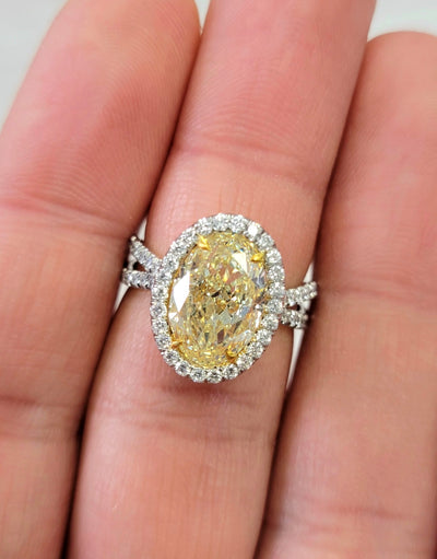 4.53ct Light Yellow Oval VVS2 GIA Ring