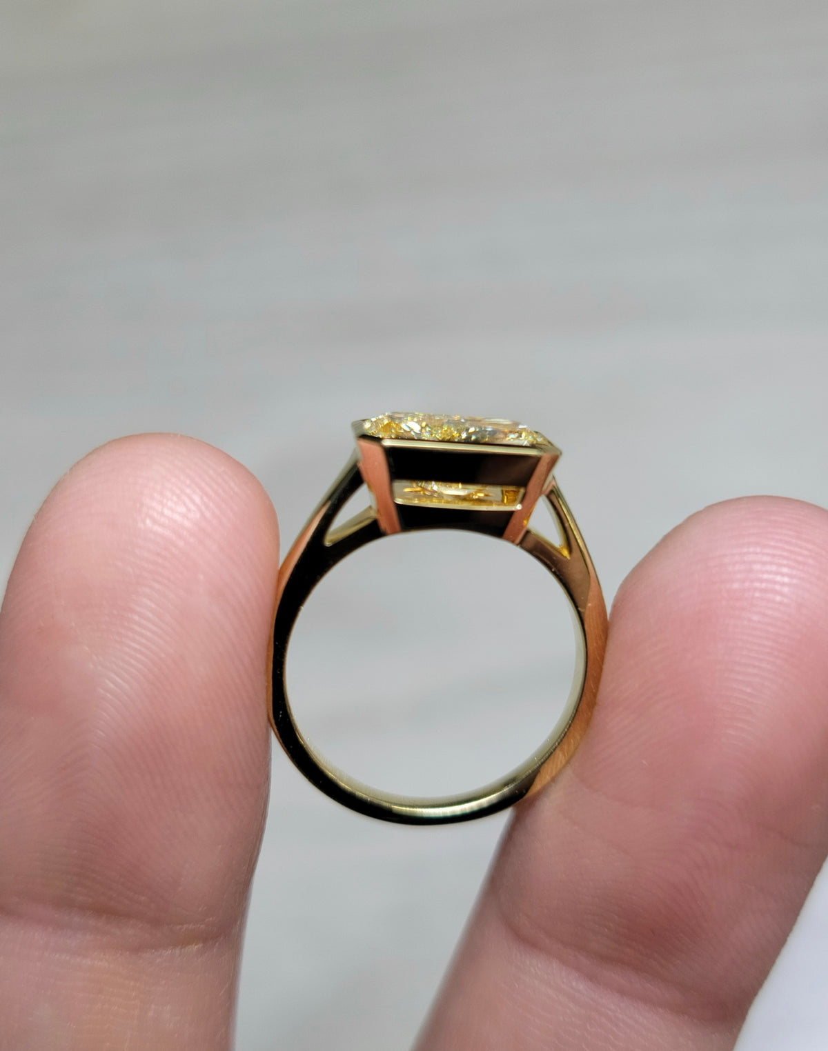 3.01ct Fancy Light Yellow Radiant Diamond East West Bezel Ring VVS2 GIA