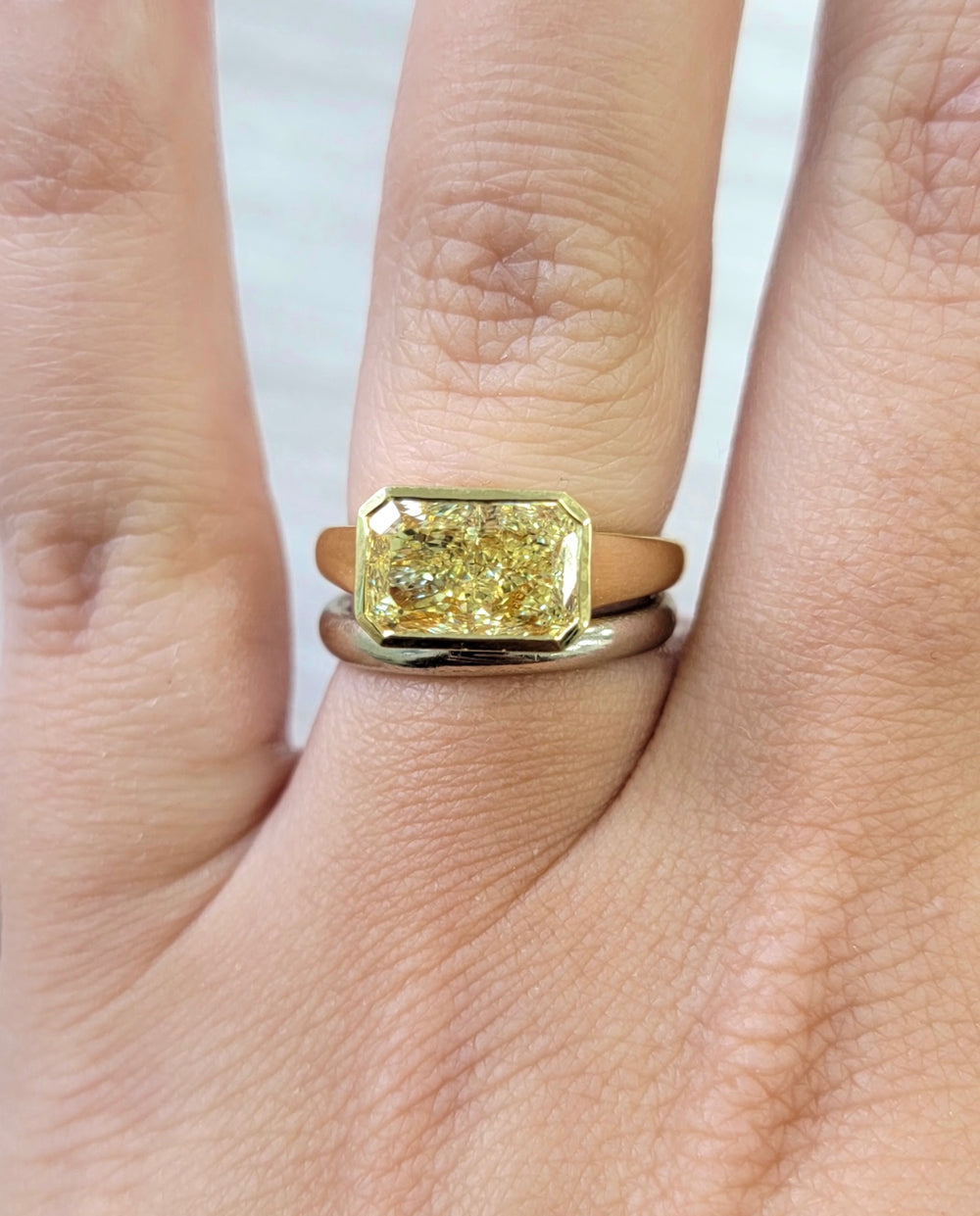 3.01ct Fancy Light Yellow Radiant Diamond East West Bezel Ring VVS2 GIA