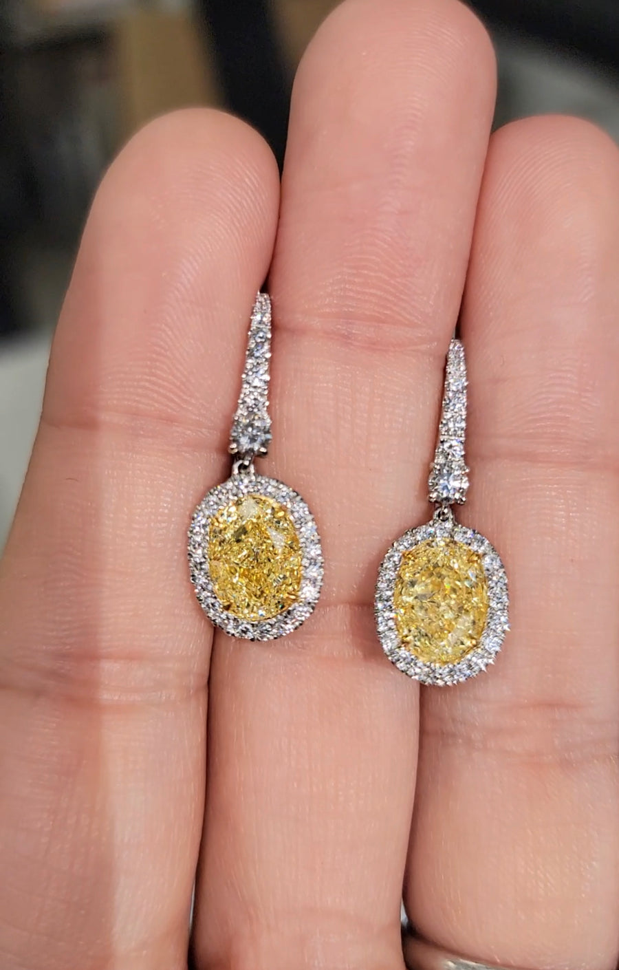 3.03ct & 3.02ct Fancy Light Yellow Oval Diamond Earrings VS GIA