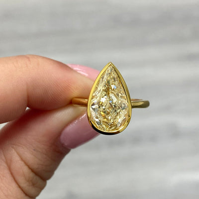 5.02 Carat Light Yellow Pear Diamond Ring